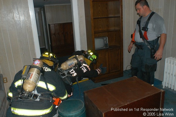 Training on primary search tactics in an acquired structure on Mountain Road.