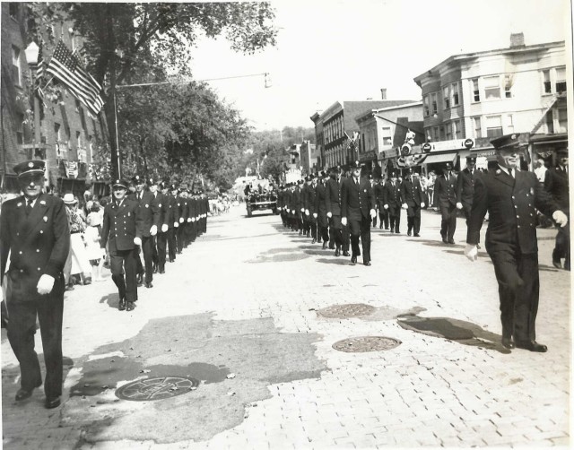 Then as now:  &quot;Proudly We Serve!&quot;